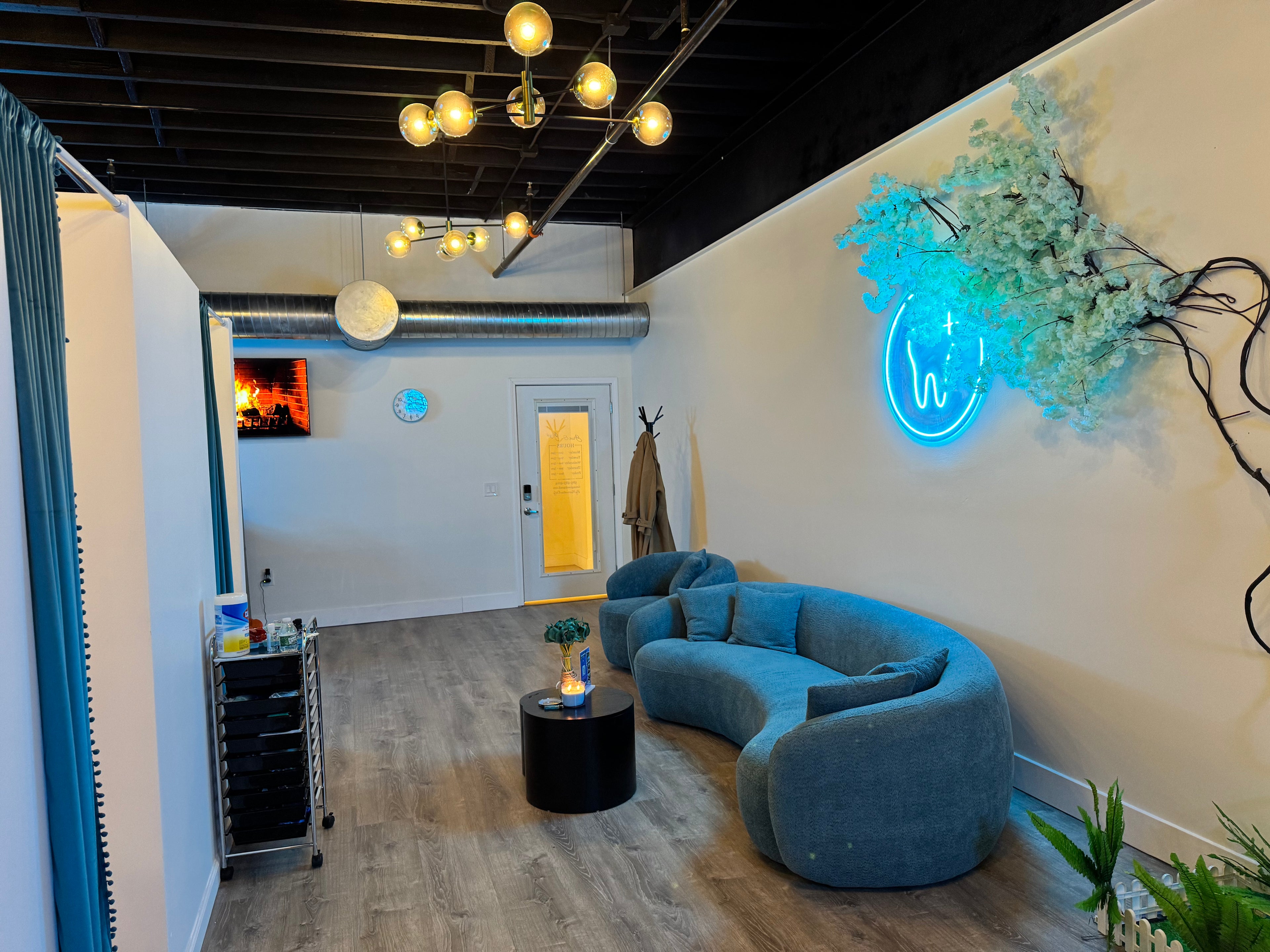 Interior of Grin & Glow’s luxury teeth whitening studio featuring a clean, modern design with soft neutral tones and elegant decor for a serene client experience.