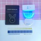 Grin & Glow Teeth Whitening Kit – vegan-friendly, non-invasive whitening system with LED light, whitening gel, and applicator for a brighter smile at home.