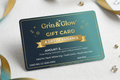 Grin & Glow gift card on a light background with decorative elements