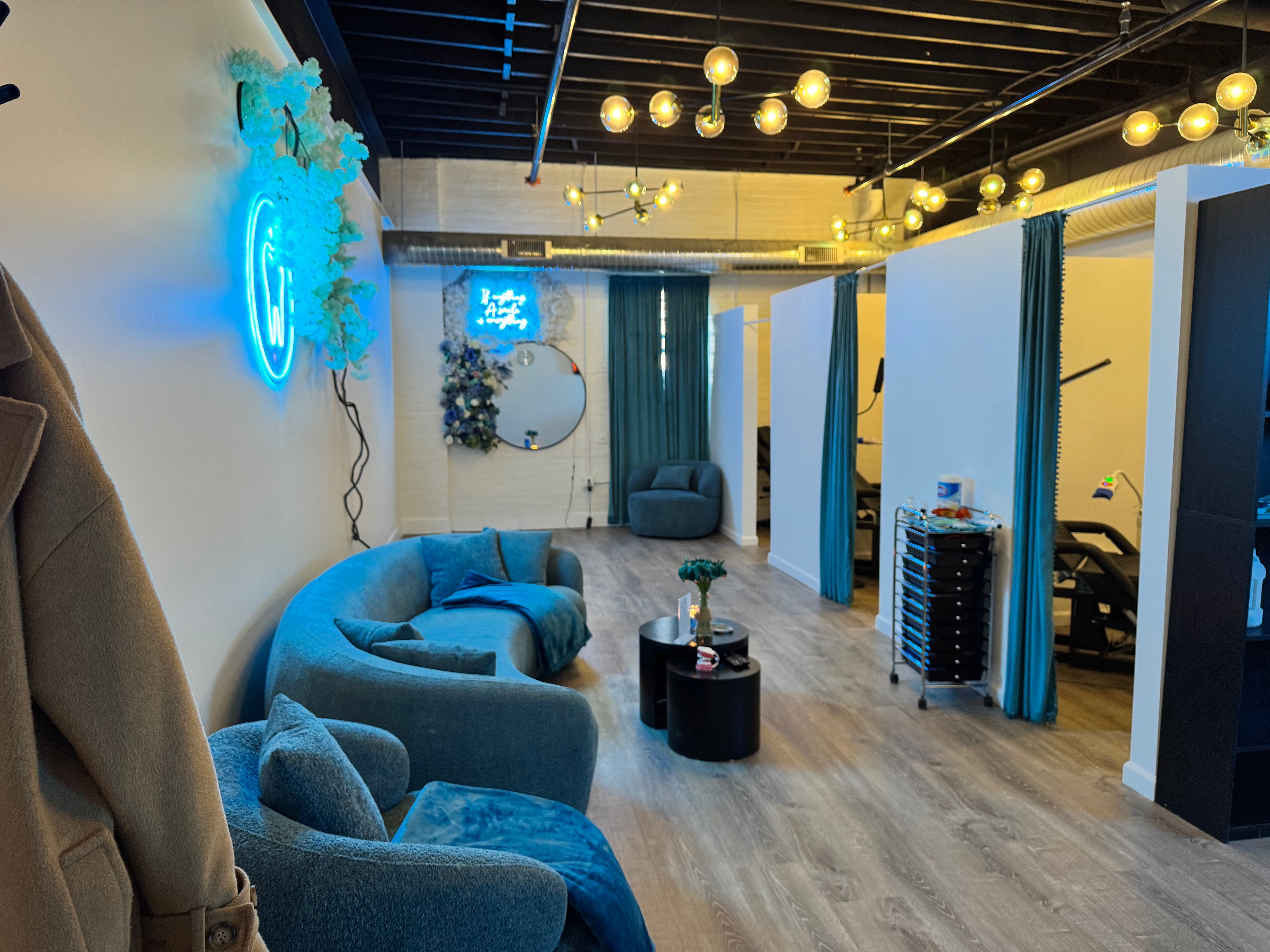 Interior of Grin & Glow’s luxury teeth whitening studio featuring a clean, modern design with soft neutral tones and elegant decor for a serene client experience.