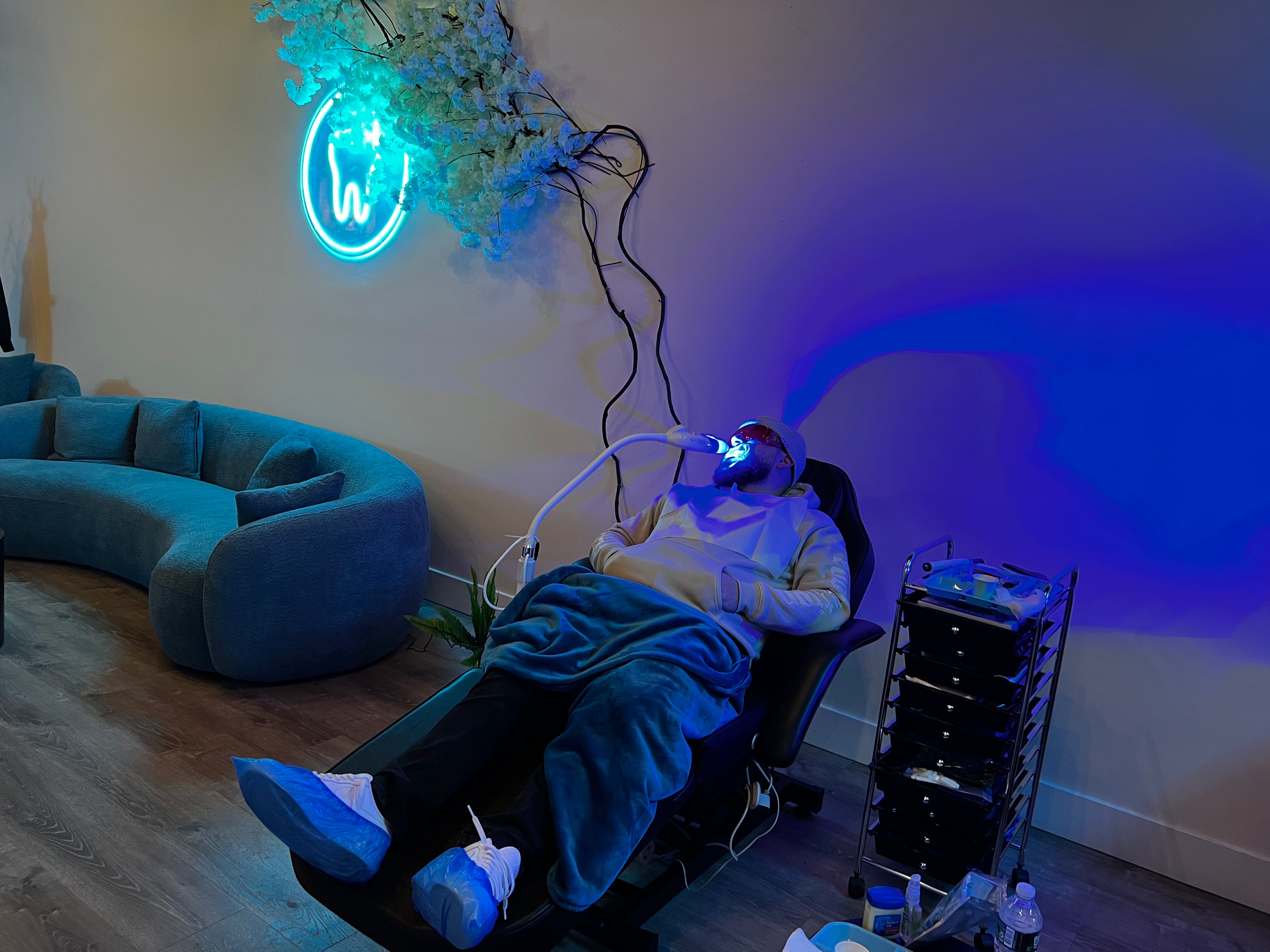 Teeth whitening treatment at Grin & Glow LLC in Rochester NY using LED light and vegan-friendly dental-grade gel for visibly whiter smiles.